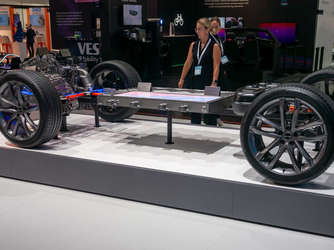 BYD Blade batteries integrated into an electric vehicle chassis on display at the IAA Summit 2023 in Munich.
