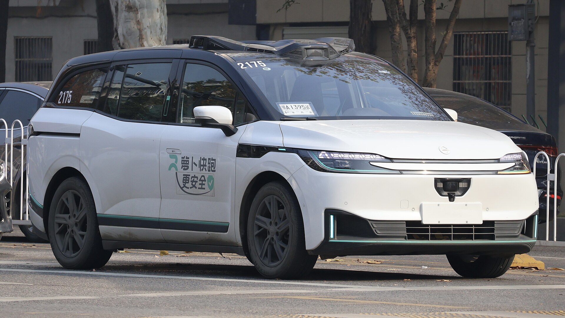 A Baidu Apollo robotaxi on a Chinese test route — the real-world agent stack Beijing is scaling.