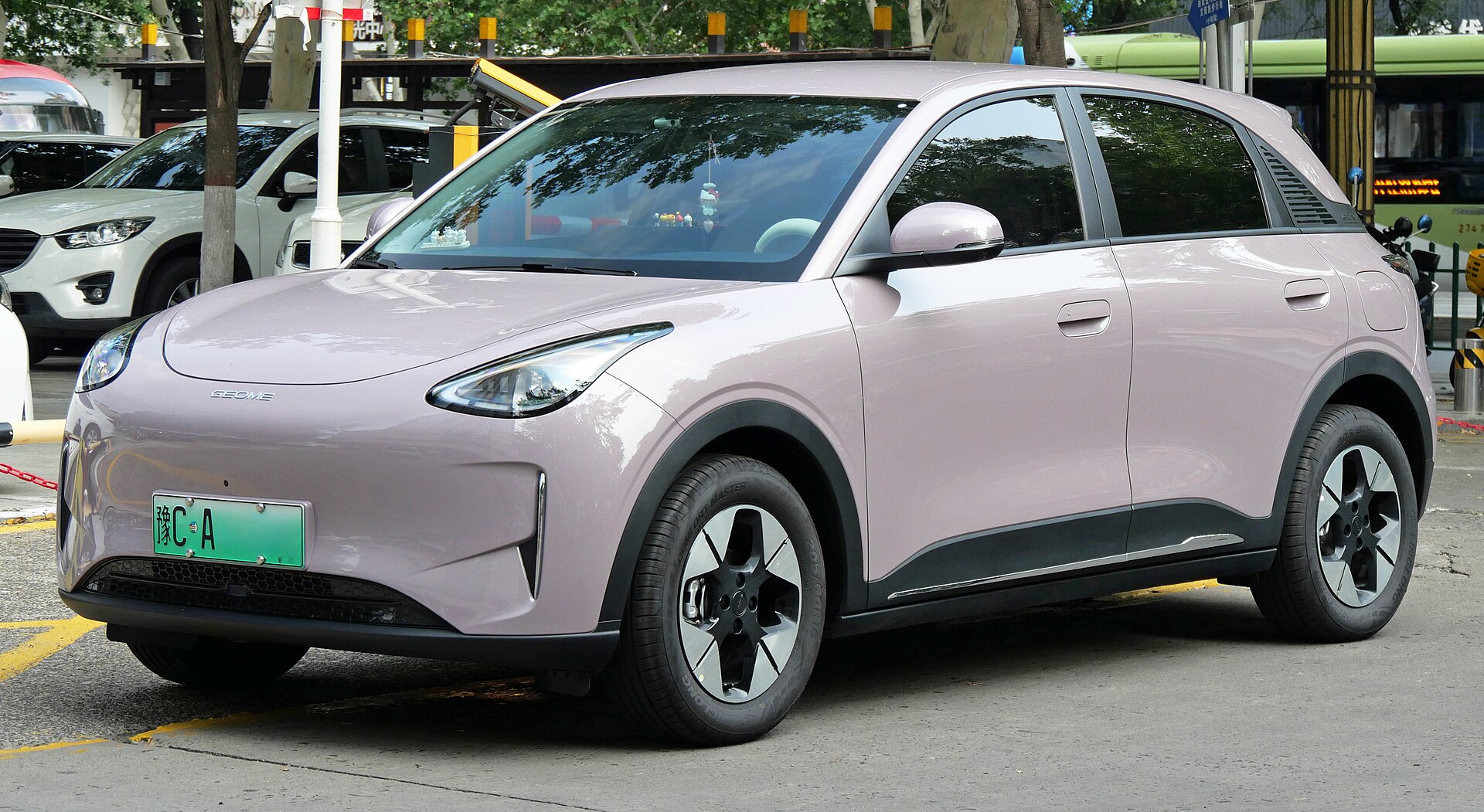A 2025 Geely Xingyuan small electric car photographed on a street in Luoyang, China.