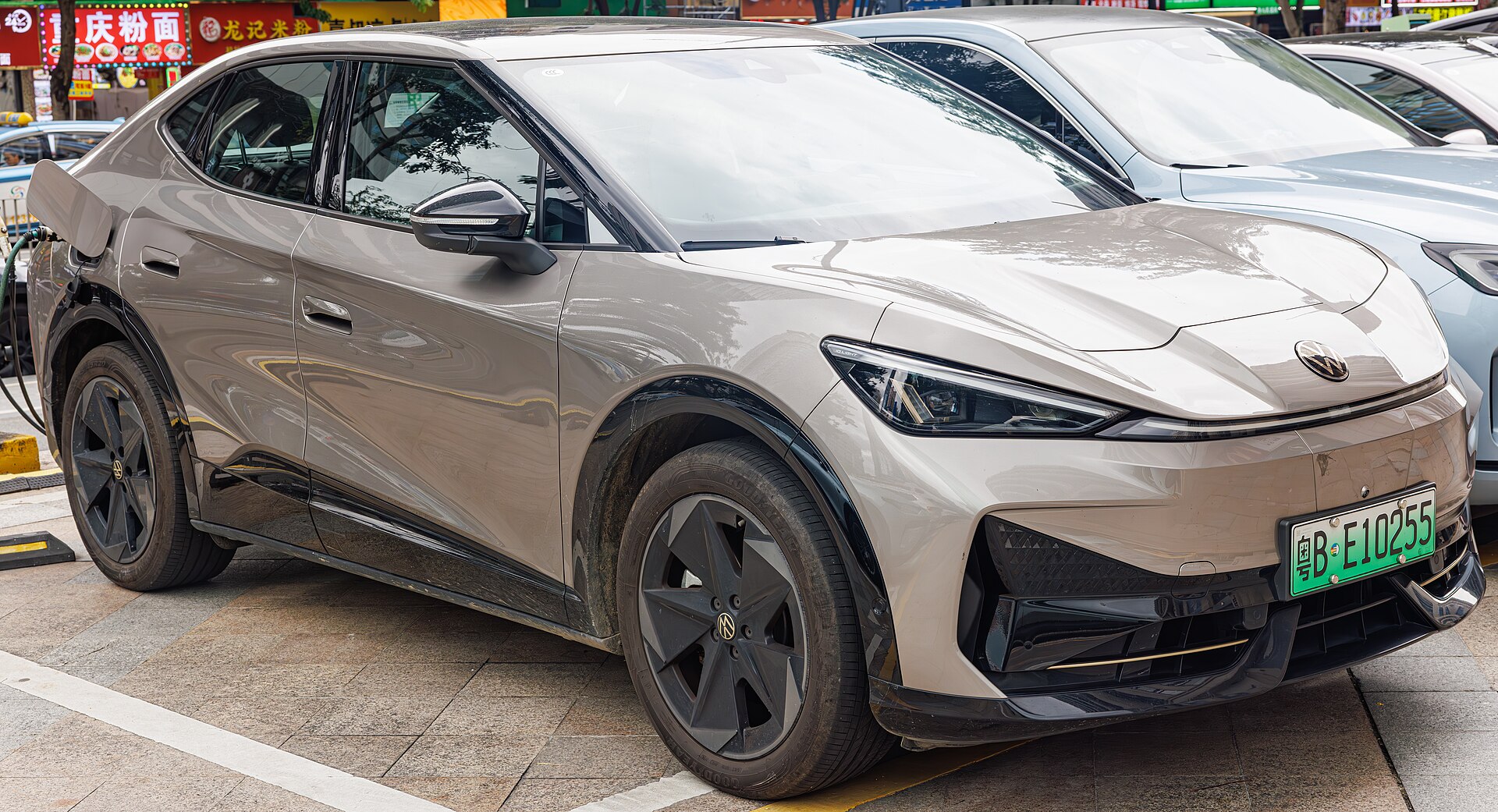 A Volkswagen ID. UNYX electric SUV parked on a street in China.