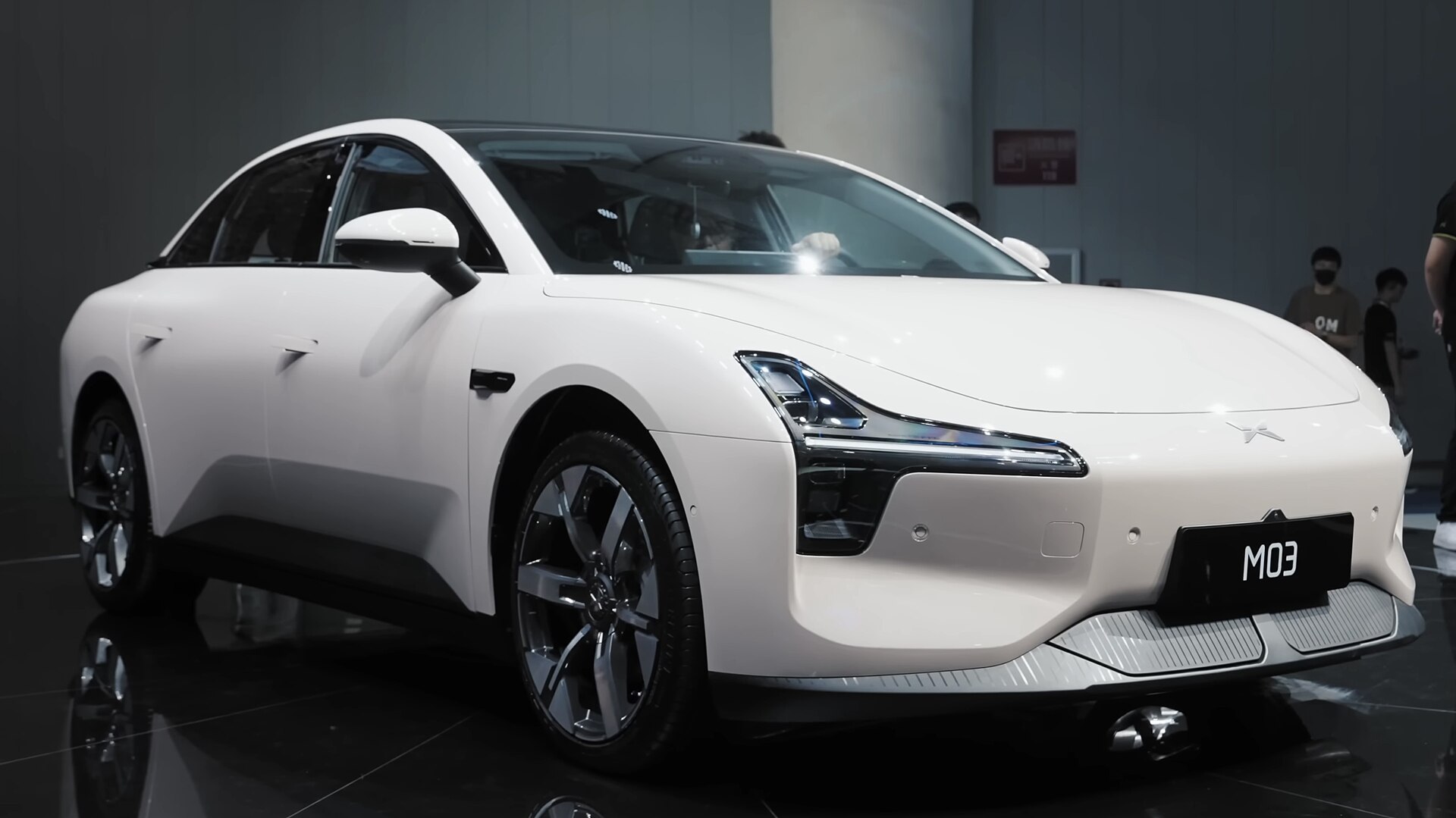 The XPeng MONA M03 sedan on display at the Chengdu Motor Show in 2024.