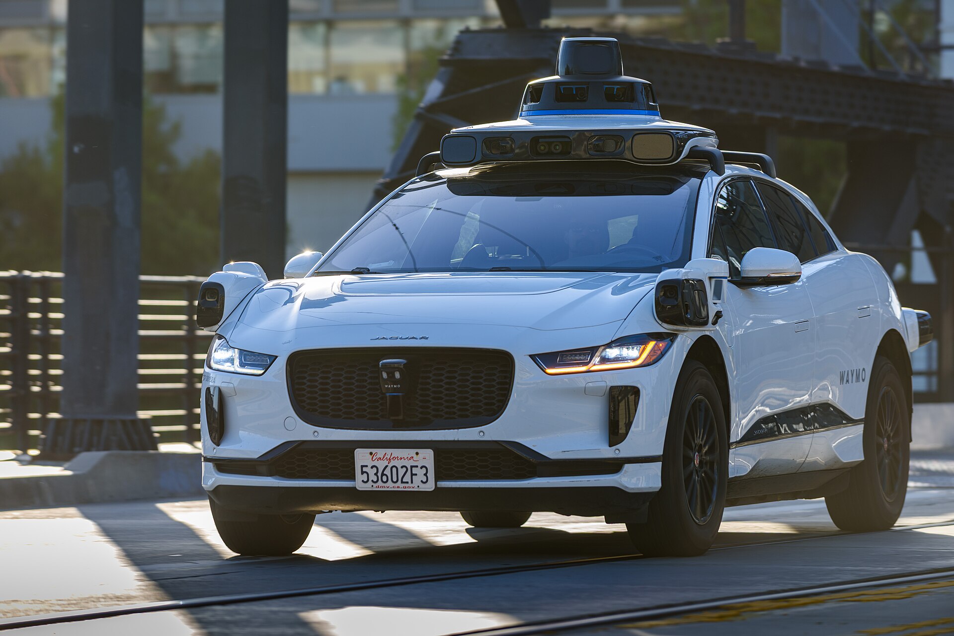 Waymo Jaguar I-Pace front-quarter view.